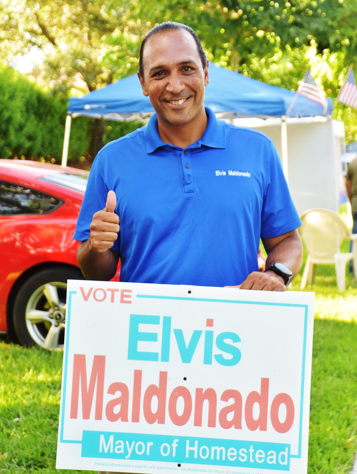 Elvis Maldonado (right) at the polls on Tuesday.